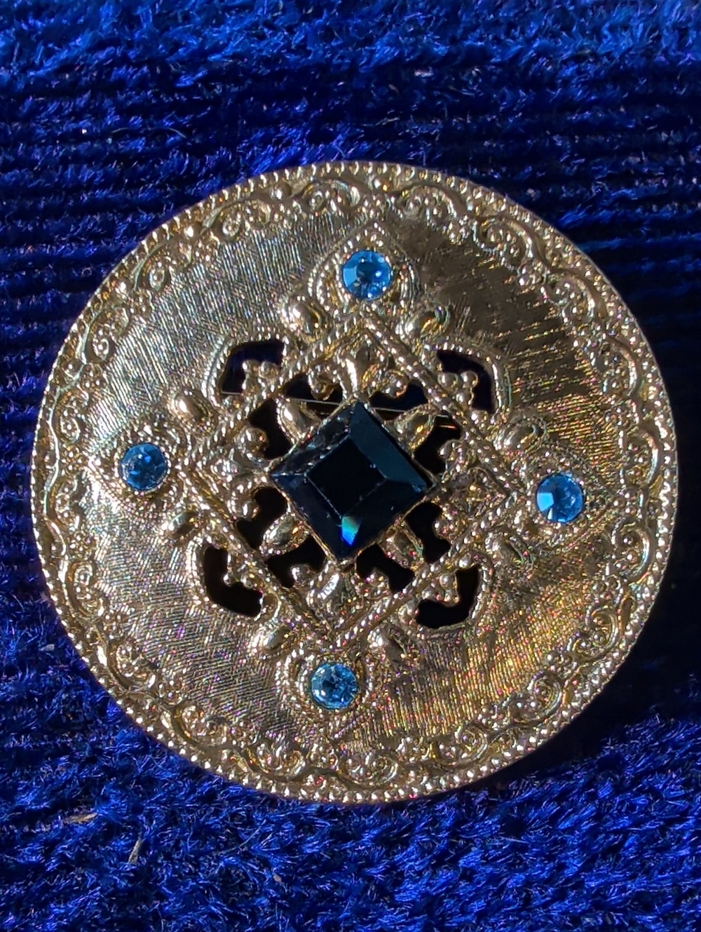 Gold-Tone Decorative Accent Brooch with Blue Gem Accents